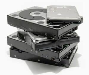 A pile of hard disk drives HDD isolated on white background.
